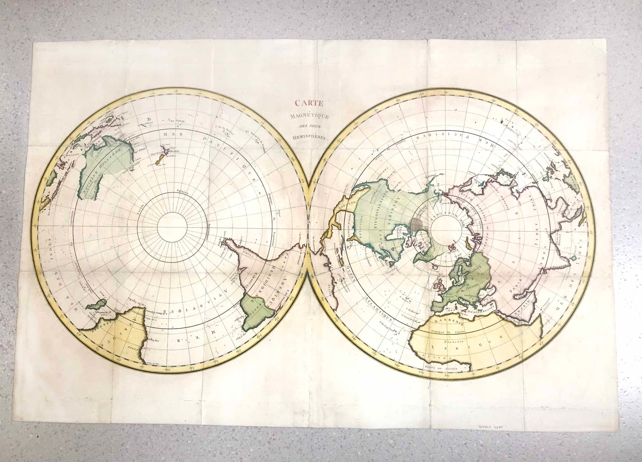 "Carte Magnétique des deux Hemisphères". Copper etching ca 1780. Modern hand coloring.

For a 30% discount enter MAPS30 at chekout&nbsp;

This map shows the two polar regions and bordering countries. Notice that the polar regions were still somewhat unknown. The are many small crosses in the oceans for missed ships or shipwrecks.