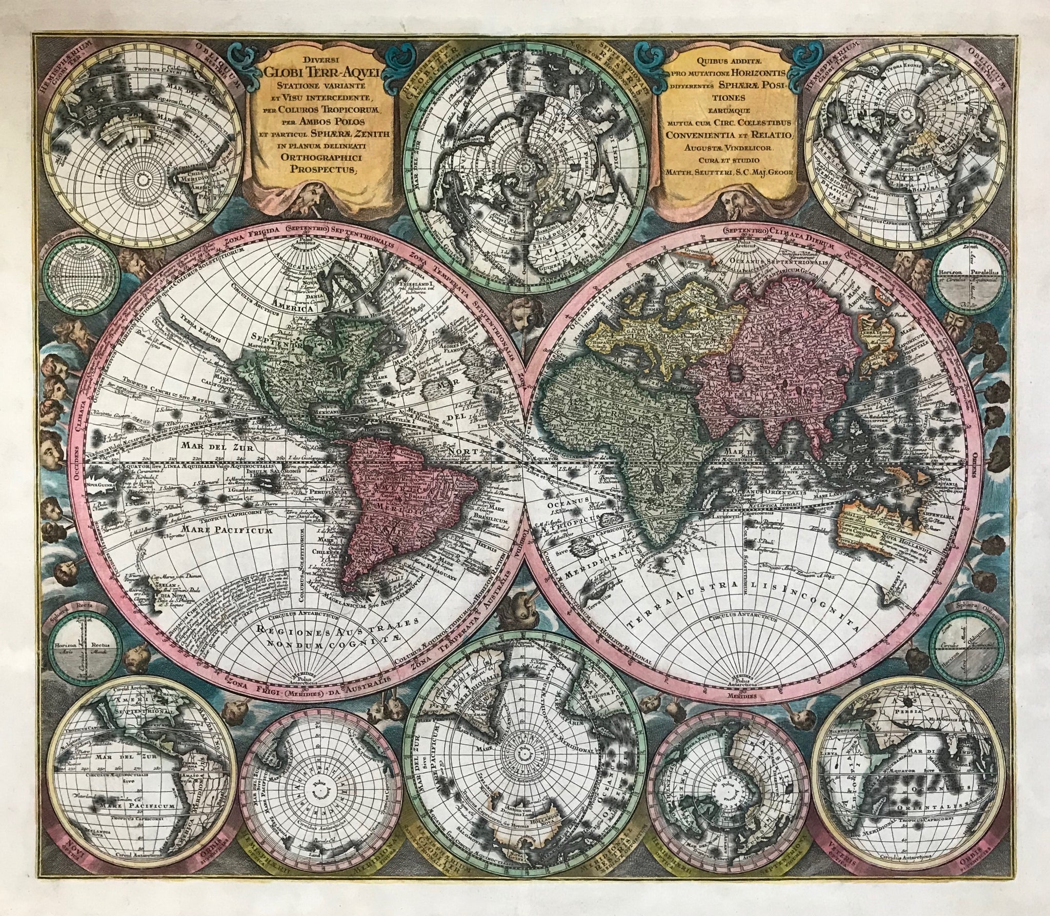 Originally hand-colored copper etching by Matthaeus Seutter (?-1757)  Augsburg, Germany, 1744  Very decorative world map with two hemispheres. These are surrounded by several globes. Clockwise from upper left: Southern hemisphere (South Pole) Australia showing- Northern hemisphere (Perpendicular from North Pole) - Northern hemisphere (oblique from North Pole) - The equator straight on - the equator oblique view - The Old World - Northern hemisphere perpendicular from North Pole 