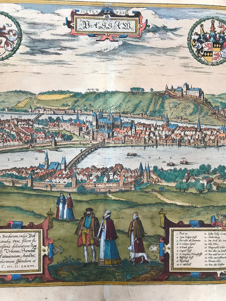 "Passau"  One of the especially "pretty" views in the entire "Civitates Orbis Terrarum" by Georg Braun and Franz Hogenberg is this general view of Passau!  Hand-colored copper etching. Dated 1576. Text in Latin about Passau on half of backside.