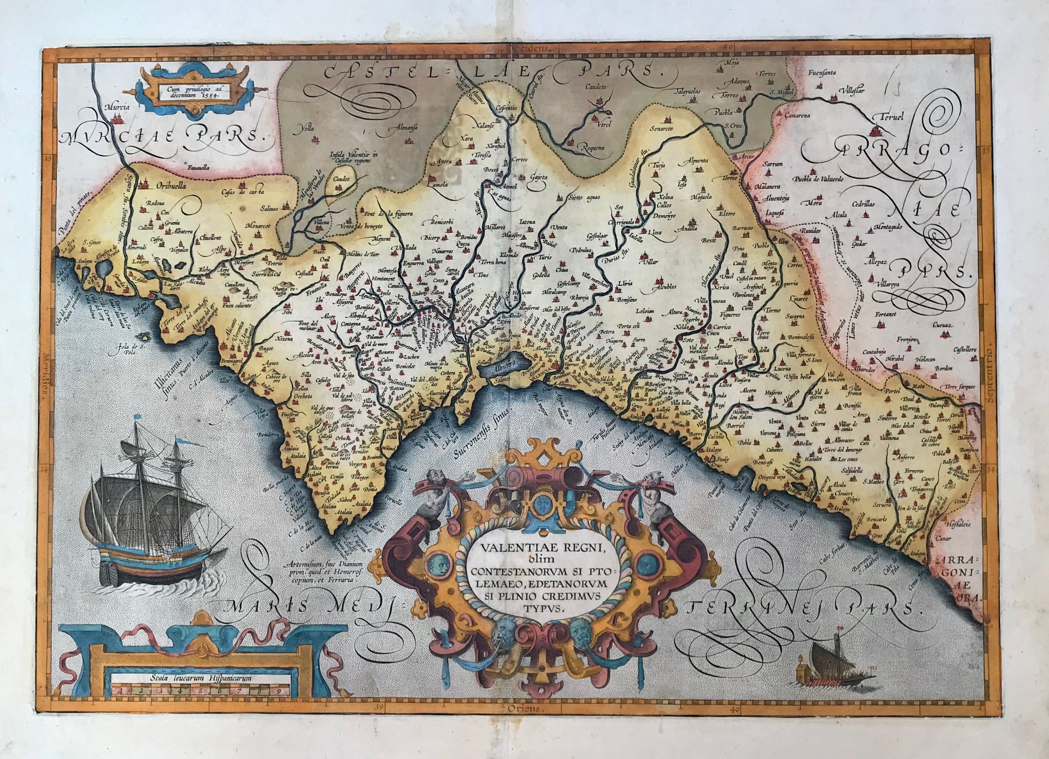 Spain, Espagña, "Regni Valentiae Typus". Province of Valencia, Spain. Copper etching from the atlas by J. Janssonius. Original hand coloring. Amsterdam, ca. 1650.  Map shows coastline of the province of Valencia and the hinterland. Two decorative cartouches, ship and sea monster. Riverse side text in German.